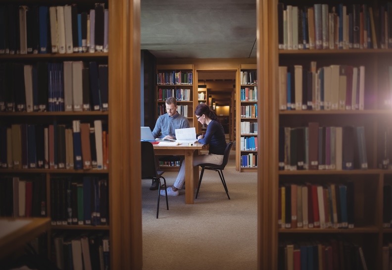 Selective Focus Photo of a Man Sitting